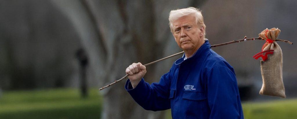 Donald Trump dressed as a working-class wanderer, carrying a bindle with a Tesla logo, symbolising the fall of once-powerful brands.